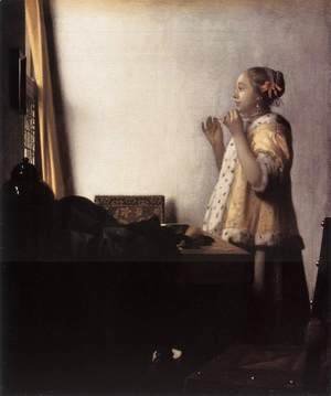 Jan Vermeer Van Delft - Woman with a Pearl Necklace 1662-64