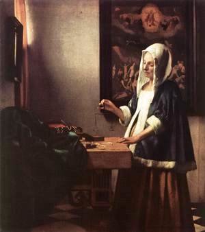 Jan Vermeer Van Delft - Woman Holding a Balance 1662-63