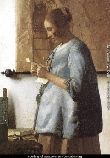 Woman in Blue Reading a Letter (detail) 1663-64